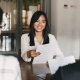 Young Asian women being interviewed by a man and a woman